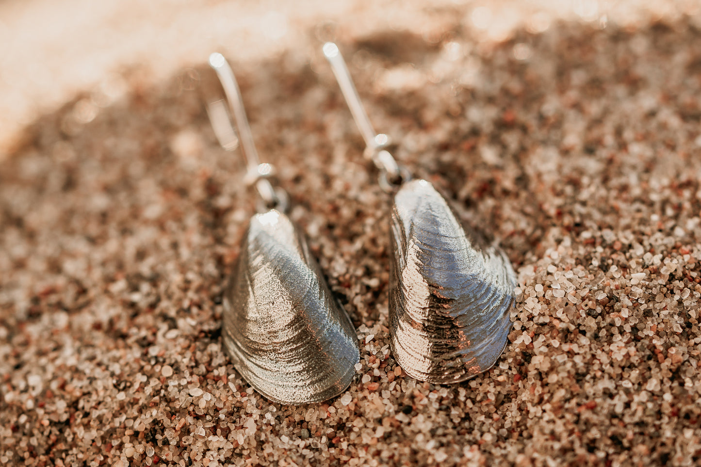 Blåmussla (mellan), örhängen med krokar